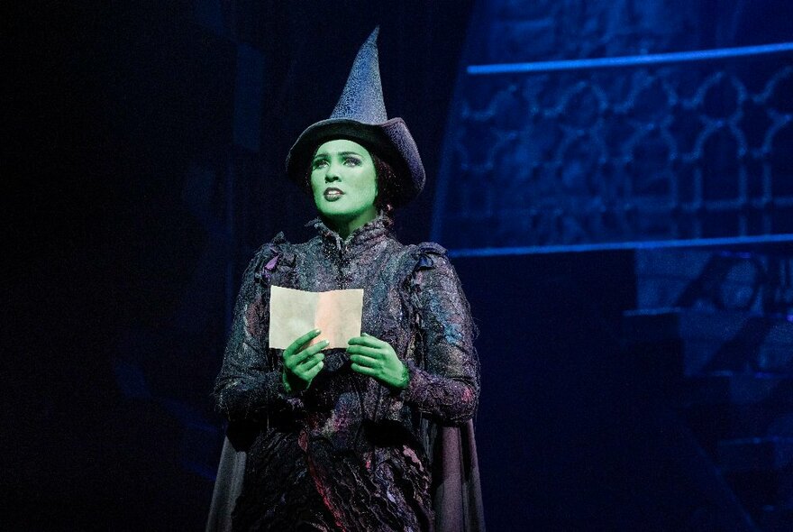 Elphaba the 'Evil' Witch on stage during a scene from WICKED the Musical.
